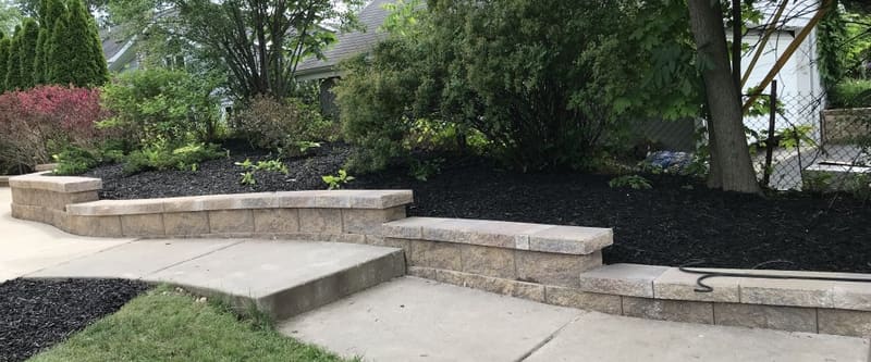 Stonework and landscape beds on a finished property.